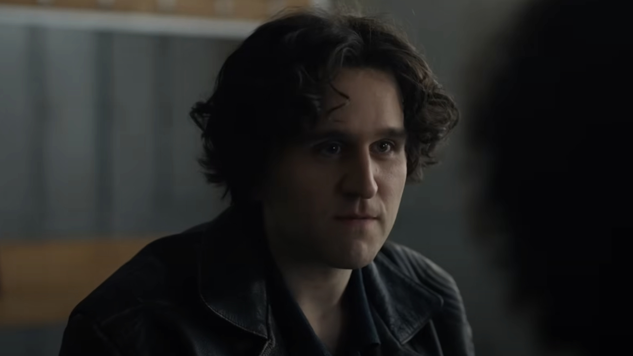 Colin (Harry Melling) speaks to a friend in Pillion.