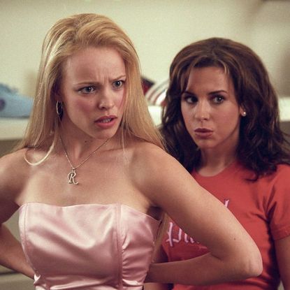 Two girls look angry and offended in a scene from "Mean Girls."