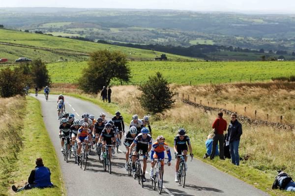 The yellow jersey group is chasing hard