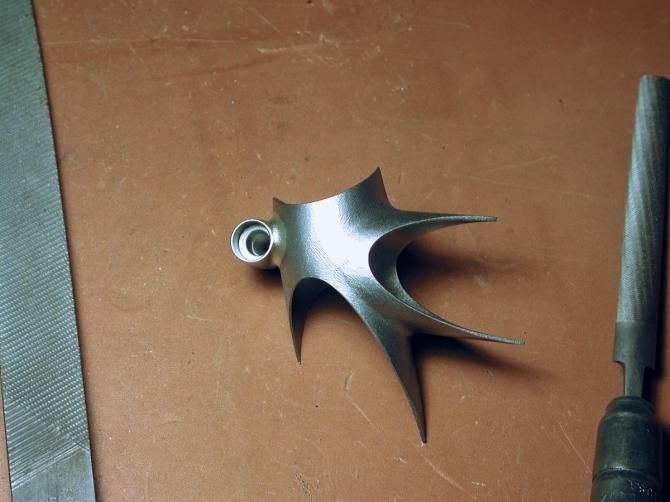 The steel lug which will eventually join the top tube and seat tube
