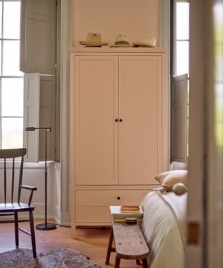 pink freestanding two door wardrobe