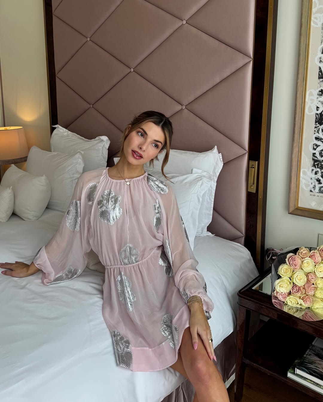 Kit Keenan with a chic updo and glowing skin