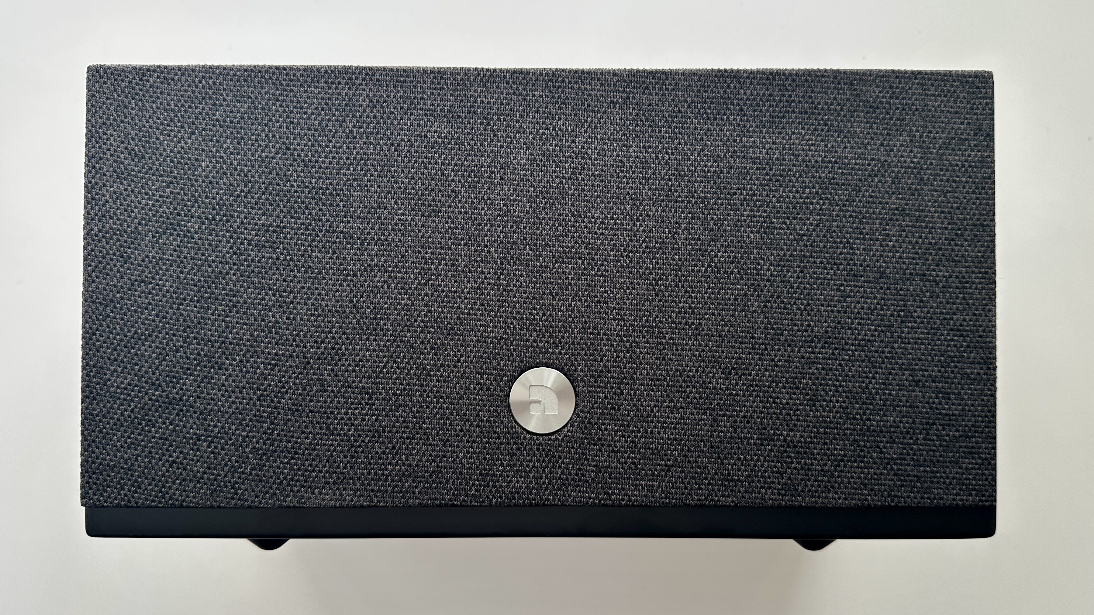 Audio Pro Addon C10 MkII wireless speakers, with a magnetic grille, on a white surface