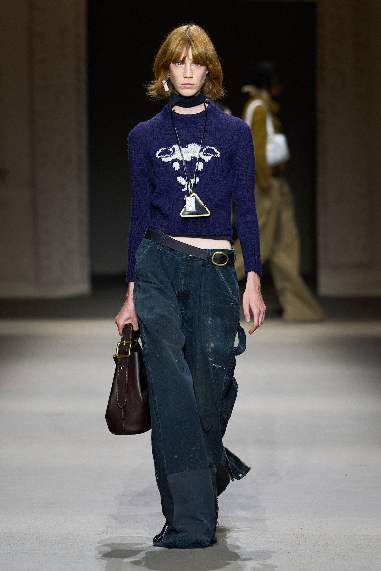 A model wore baggy jeans on the Coach Spring 2026 runway