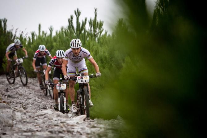 Team mates Nino Schurter, Matthys Beukes, Gert Heyns and Philip Buys lead the race