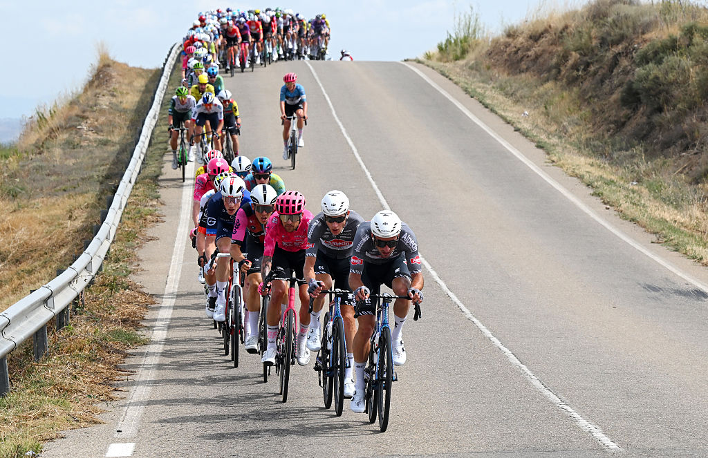 ALFARO, SPAIN - AUGUST 31: James Shaw of Great Britain and Team EF Education - EasyPost, Ramses Debruyne of Belgium and Edward Planckaert of Belgium and Team Alpecin - Deceuninck lead the peloton during the La Vuelta - 80th Tour of Spain 2025, Stage 9 a 195.5km stage from Alfaro to Estacion de Esqui de Valdezcaray 1541m / #UCIWT / on August 31, 2025 in Alfaro, Spain. (Photo by Dario Belingheri/Getty Images)
