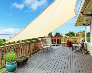 A shade sail used on a decked terrace