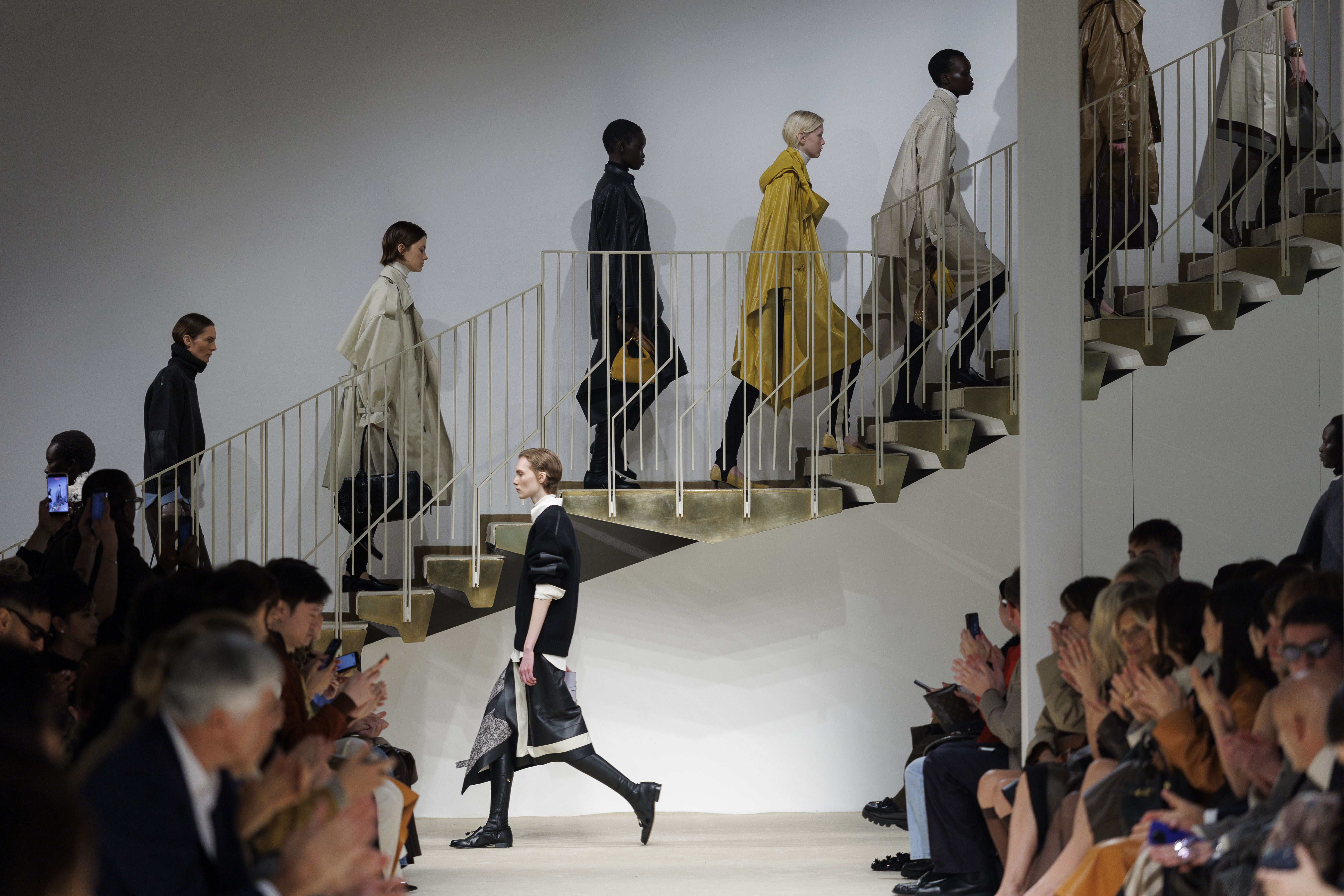 models walking in the finale of tod's aw26 show