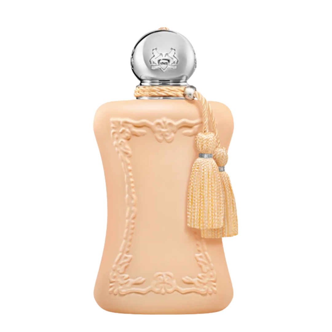 A product shot of the Parfums de Marly Cassili Eau de Parfum, with its peach bottle and tassels, on a white background