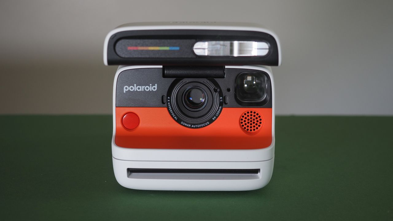 Polaroid Flip camera on a green surface