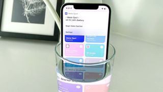 An iPhone in water, demonstrating how to eject water from an iPhone