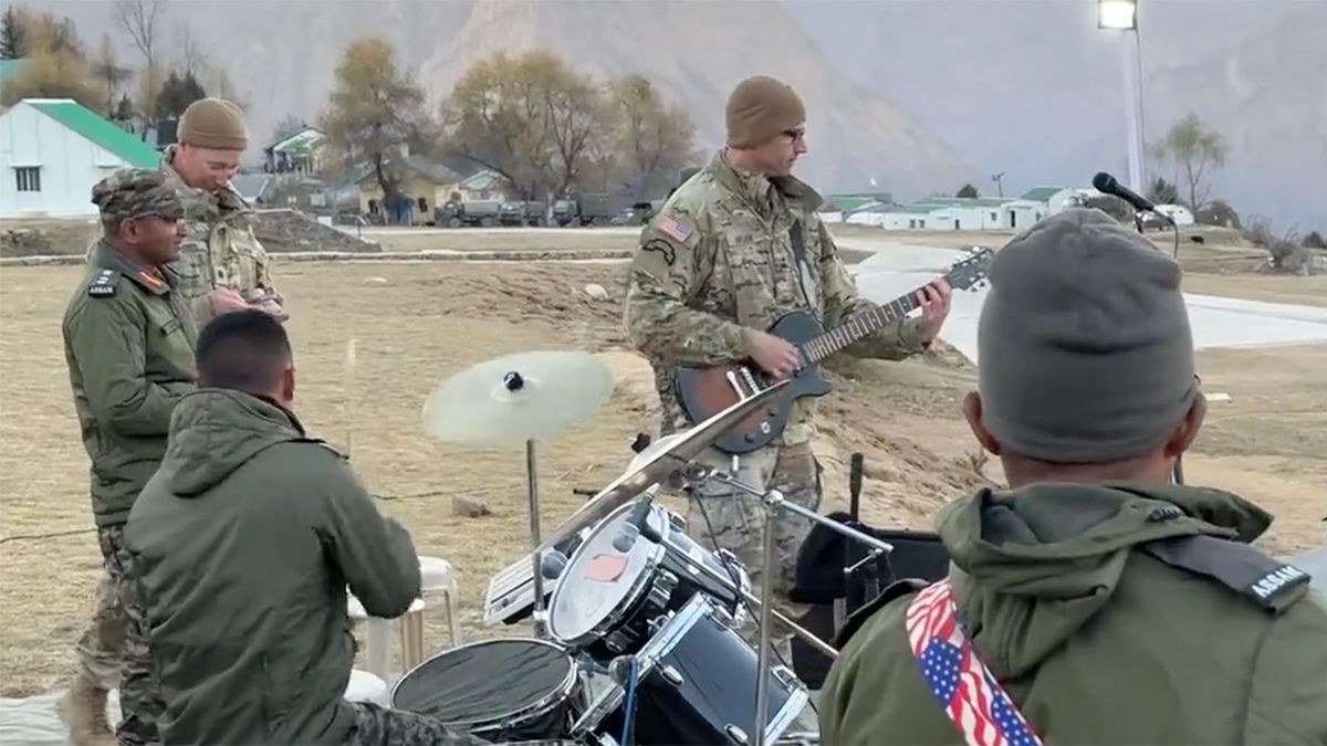 Soldiers from the Indian ASSAM regiment 11th Airborne Division of the US Army perform