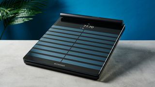 Withings Body Scan smart scales on a hard surface