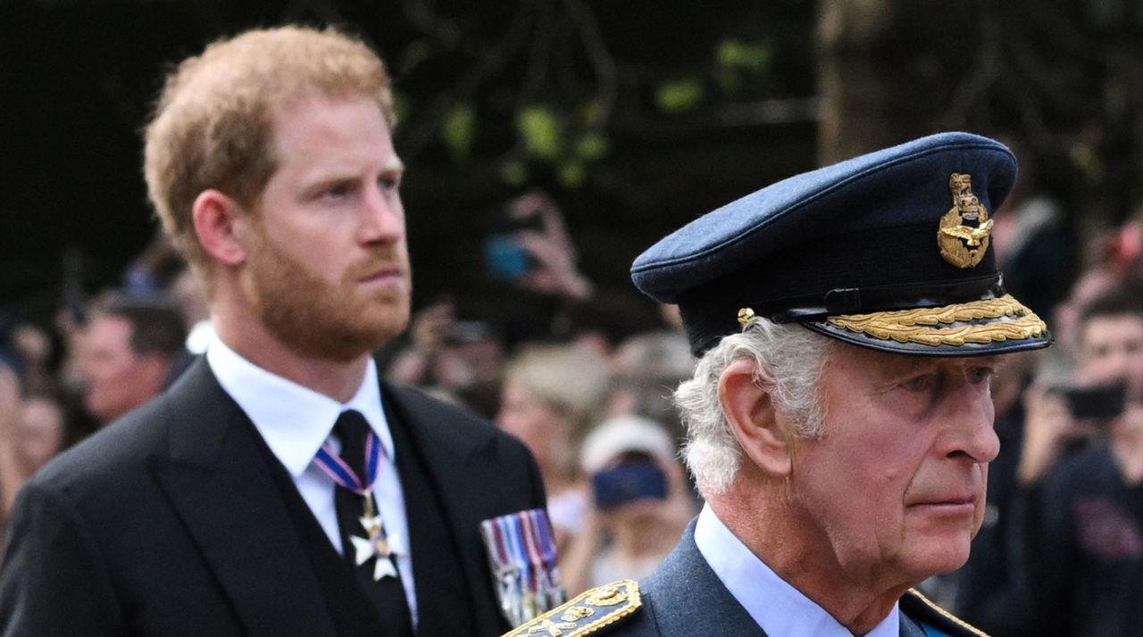 Britain&#039;s King Charles III and Britain&#039;s Prince Harry, Duke of Sussex walk behind the coffin of Queen Elizabeth.