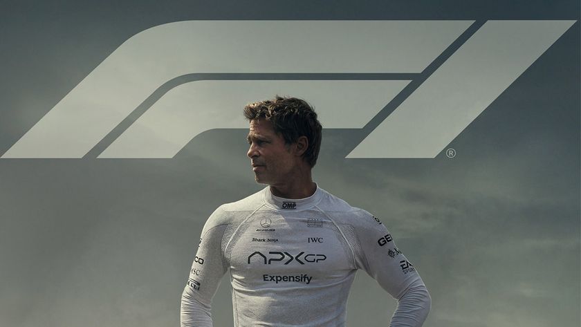 Brad Pitt looks over his right shoulder with &#039;F1&#039; written behind him 