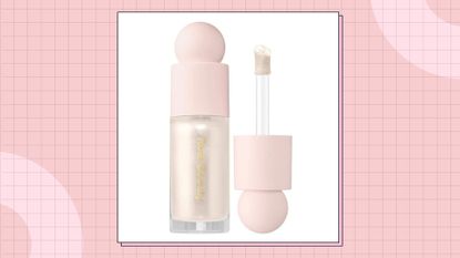 Rare Beauty Positive Light Liquid Luminizer in shade Enlighten/ in a pink template with light pink semi circles with a check-print overlay