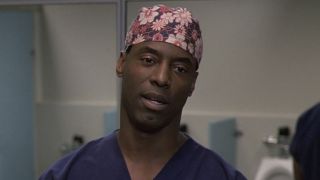 Preston Burke (Isaiah Washington) speaks to Christina Yang and Meredith Grey on Grey's Anatomy