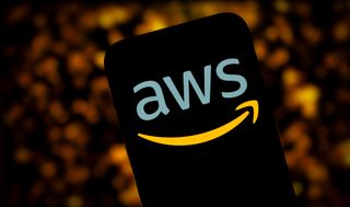 AWS logo displayed on a smartphone with dark background
