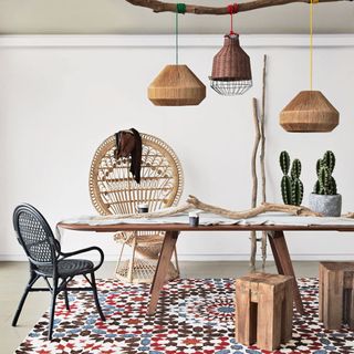 room with rattan chair and lampshade and wooden table