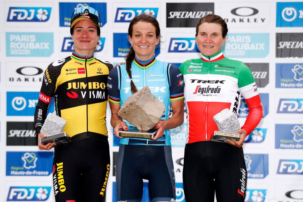 ROUBAIX FRANCE OCTOBER 02 LR Marianne Vos of Netherlands and Jumbo Visma Team on second place stage winner Elisabeth DeignanArmitstead of United Kingdom and Team Trek Segafredo and Elisa Longo Borghini of Italy and Team Trek Segafredo on third place pose with trophies on the podium during the podium ceremony after the 1st ParisRoubaix 2021 Womens Elite a 1164km race from Denain to Roubaix ParisRoubaixFemmes ParisRoubaix on October 02 2021 in Roubaix France Photo by Bas CzerwinskiGetty Images