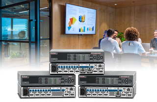 The Extron Compact 4K/60 Seamless Scaling Switchers stacked in front of an image of people at a table in a conference room.