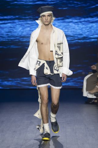 Man on SS Daley runway in nautical inspired outfit