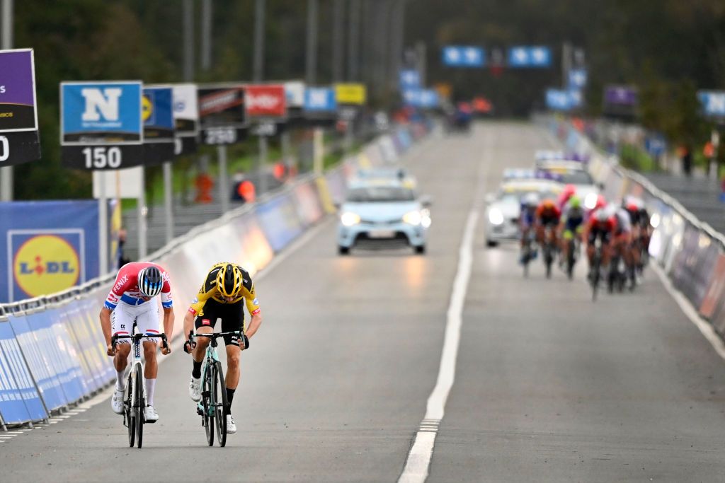 Dutch Mathieu van der Poel of AlpecinFenix and Belgian Wout Van Aert of Team JumboVisma pictured during the arrival of the Ronde van Vlaanderen Tour des Flandres Tour of Flanders one day cycling race 241 km from Antwerp to Oudenaarde Sunday 18 October 2020 BELGA PHOTO ERIC LALMAND Photo by ERIC LALMANDBELGA MAGAFP via Getty Images