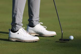 Cameron Young's shoes and golf ball