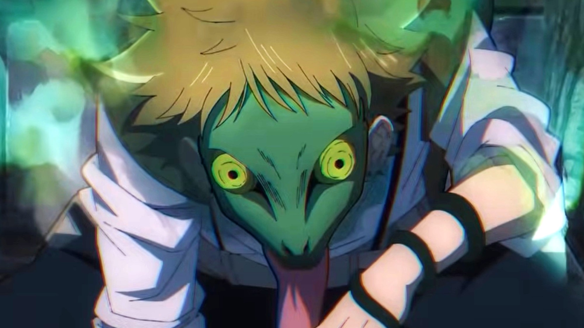 A man wearing a green mask with big yellow eyes on The Vermilion Mask