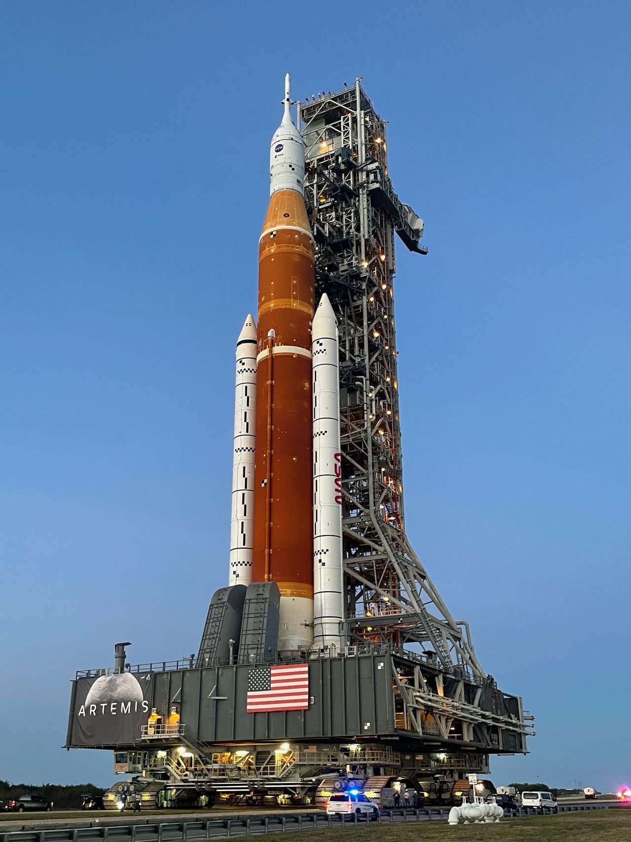 The Artemis 1 stack is being hauled to the pad by NASA's crawler-transporter 2, one of the largest vehicles every built. CT-2 was constructed in 1965 to support NASA's Apollo moon program and has been modified over the past few years to serve Artemis.
