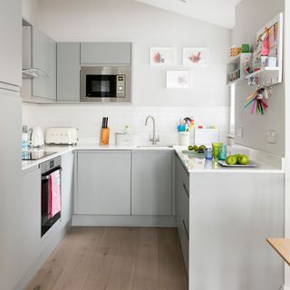 kitchen with cabinet and wooden flooring