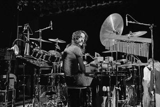 Neil Peart behind his kit at the Public Auditorium in Cleveland, Ohio on 17th December 1977