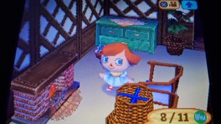 A screenshot of a red-headed character in Animal Crossing: Wild World.