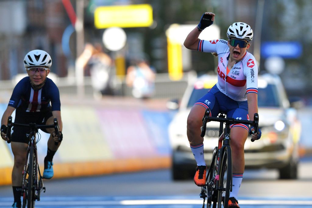 LEUVEN BELGIUM SEPTEMBER 25 Zoe Backstedt of The United Kingdom R celebrates at finish line as race winner ahead of Kaia Schmid of The United States L during the 94th UCI Road World Championships 2021 Women Junior Road Race a 752km race from Leuven to Leuven flanders2021 on September 25 2021 in Leuven Belgium Photo by Luc ClaessenGetty Images