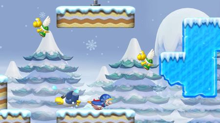 Screenshot from New Super Mario Bros. Wii showing Mario sliding around in a Penguin suit power-up.