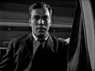 William Shatner in The Twilight Zone episode , Nightmare at 20,000 Feet looking fraught