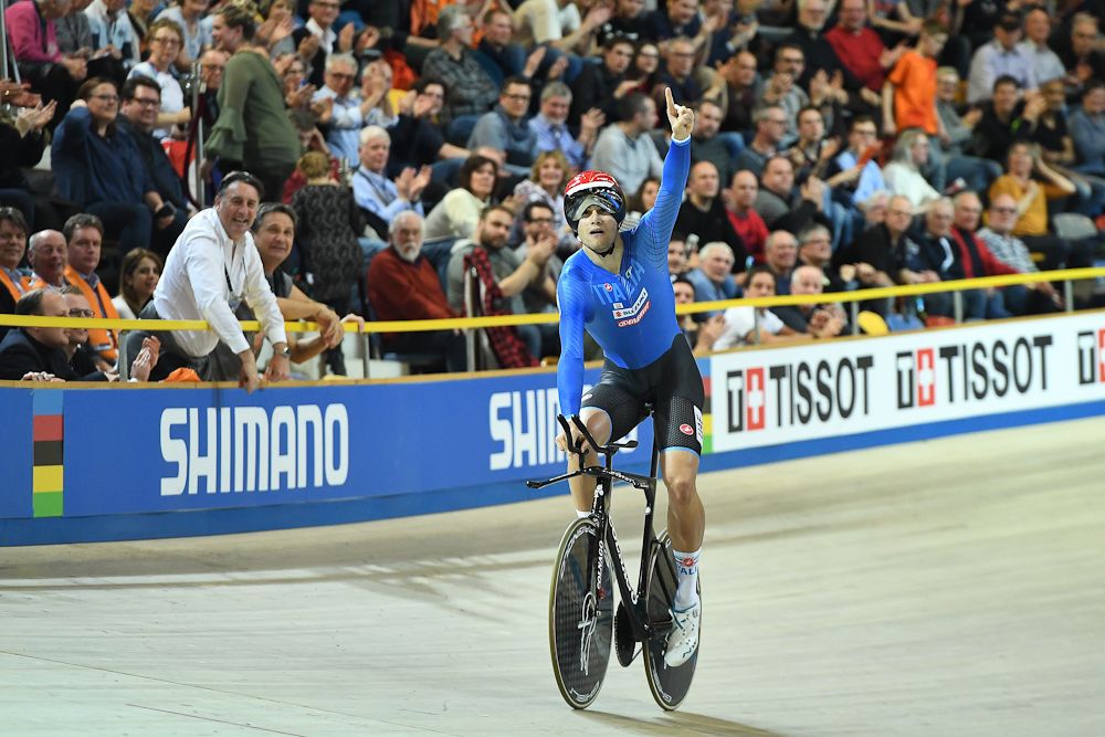Italy's Filippo Ganna celebrates after the men's individual pursuit race final during the UCI Track Cycling World Championships
