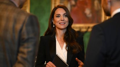 Kate Middleton's sharp tuxedo jacket highlighted the Princess of Wales' new favorite fashion trend and her go-to royal engagement outfit
