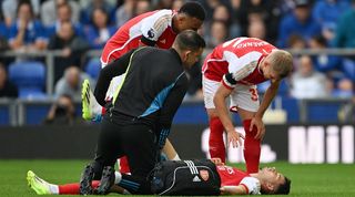 Arsenal's Gabriel Martinelli receives treatment after suffering a hamstring injury against Everton at Goodison Park in September 2023.