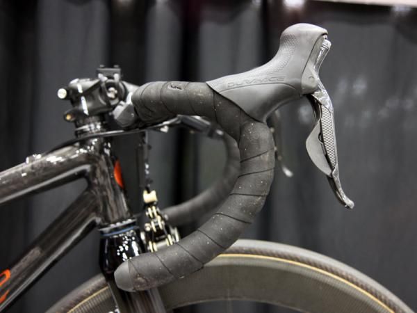Lever reach is shortened for easier braking and shifting with small hands on the Enve Composites bar.