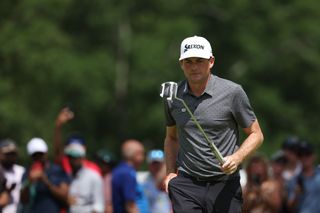 Keegan Bradley of the United States reacts to making his putt for birdie on the fourth green during the final round of the Travelers Championship