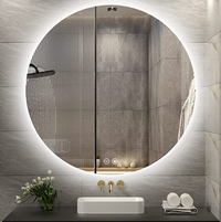 Backlit dimmable bathroom mirror
This backlit mirror gives the same look, with a round, halo-like light that aids the bathroom pampering experience. It's also touch screen and anti-fog for a bit of bathroom technology.