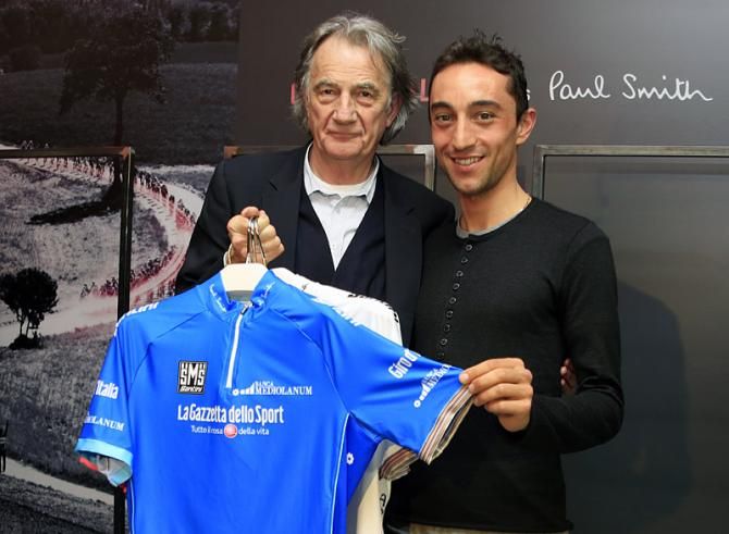 Designer Paul Smith and Italian professional Matteo Rabottini, a stage winner and mountains classification champion from 2012, present the Giro's new mountains classification jersey.
