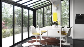 black lean to conservatory with glossy black floor tiles