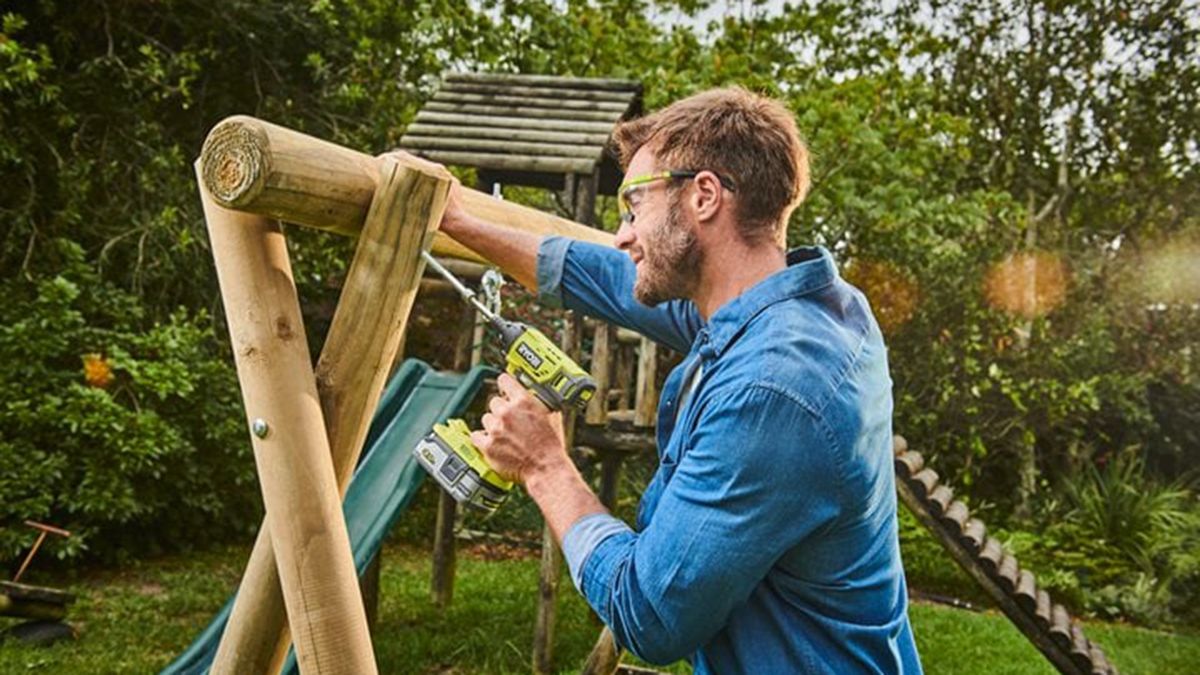 man using power tool