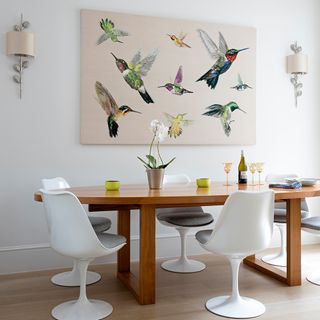 dining room with wooden flooring and tulip chair