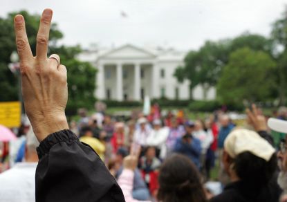 Peace sign in front of the White House