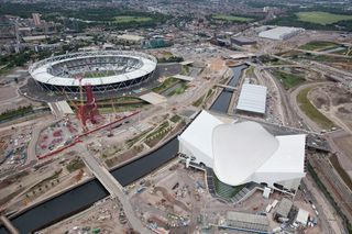 London 2012 Aquatics Centre by Zaha Hadid: View of the Aquatics Centre with Water Polo Arena and Olympic Stadium