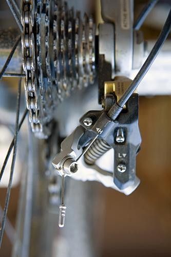 The rear derailleur loses the solidity that came from being mounted directly to the axle but the Shadow design should help keep it tucked out of harm's way.