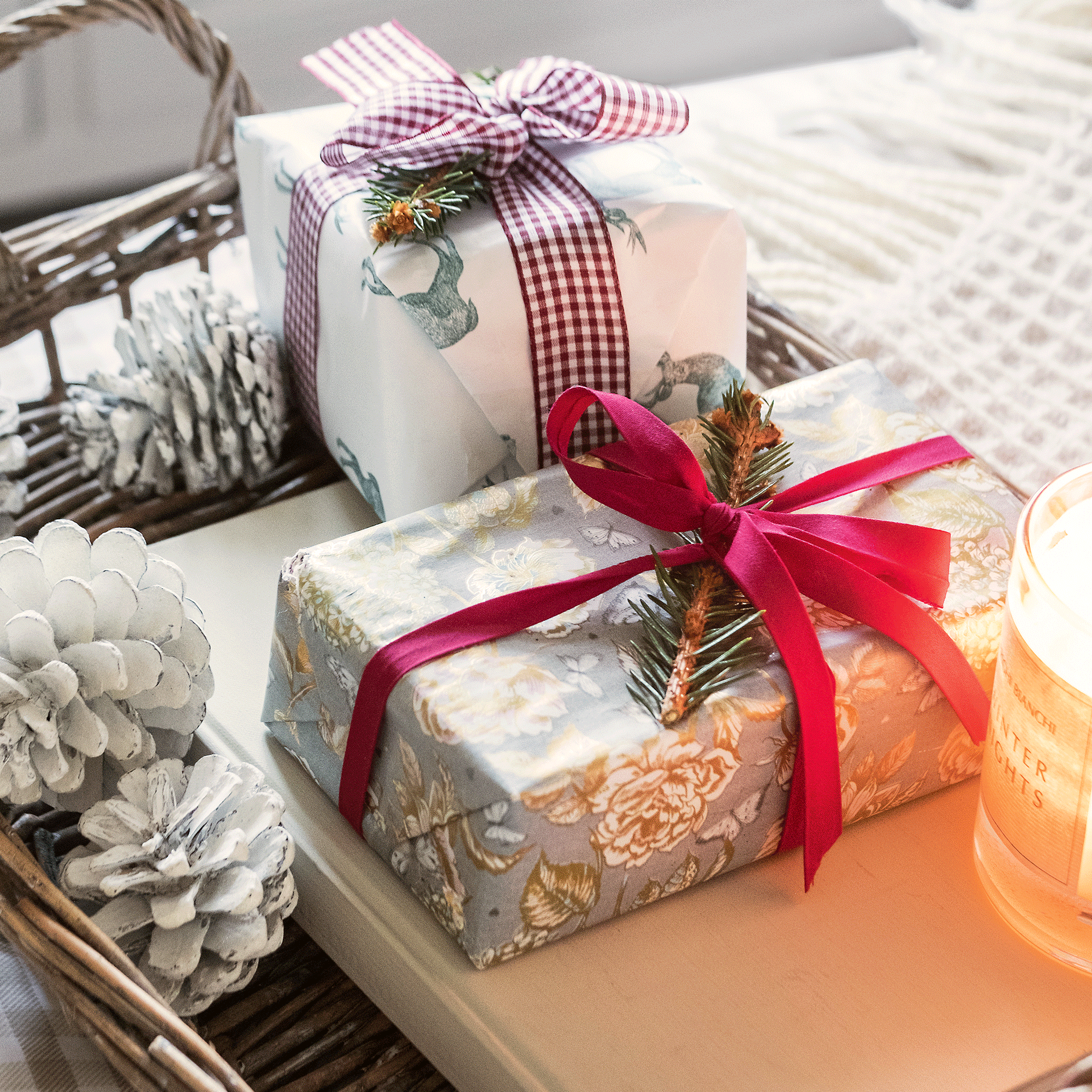 wrapped christmas presents pine cones